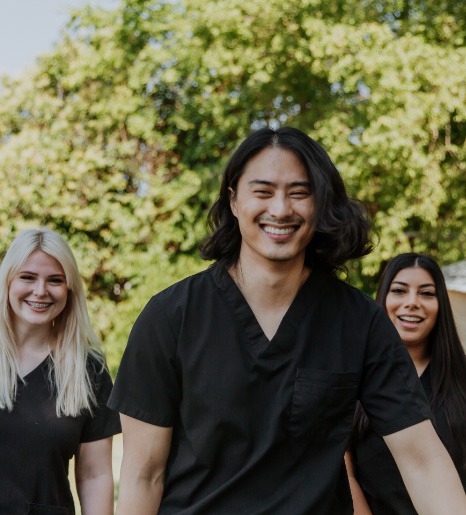 team members smiling