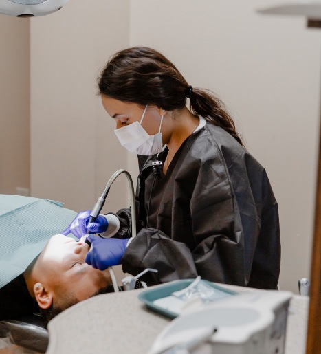 team member working on patient